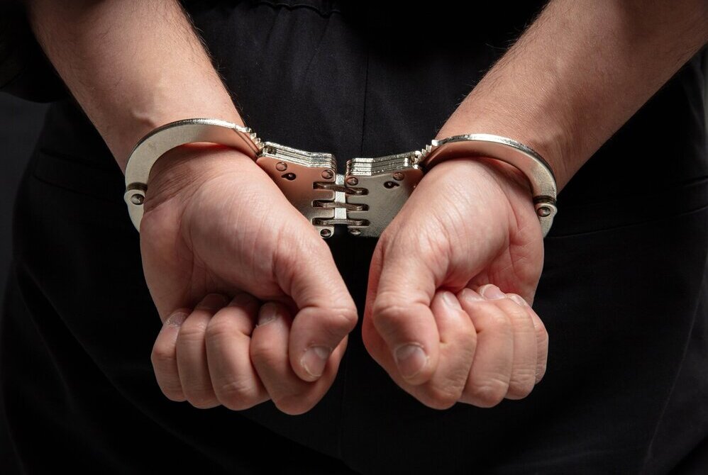 Arrested, Handcuffs