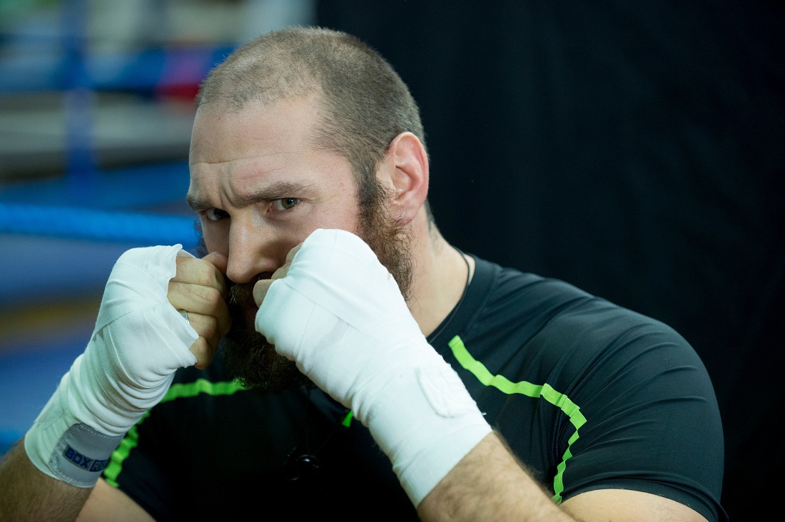 Tyson Fury attends a training photocall in Peacocks Gymnasium in London ahead of his fight