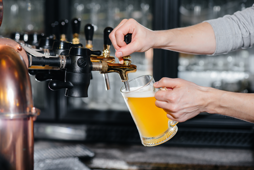 Beer on tap being poured