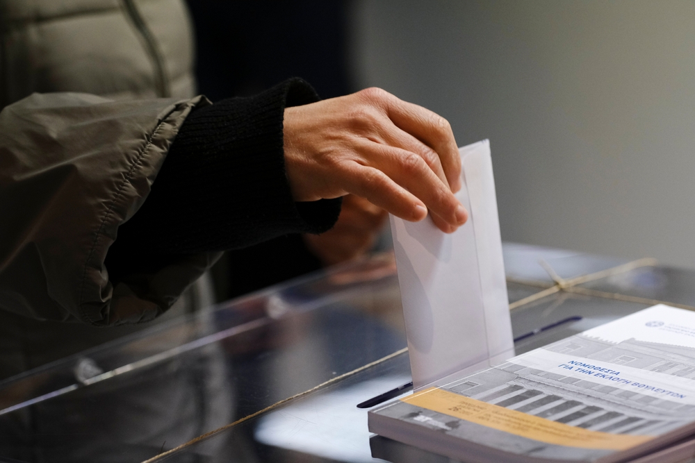 Voter casts their ballot. Alexandros Michailidis, Shutterstock