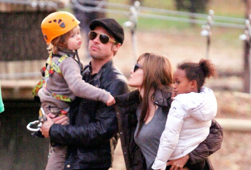 Brad Pitt and Angelina Jolie take their children Pax, Zahara and Shiloh to a park in Budapest. Northfoto, Shutterstock