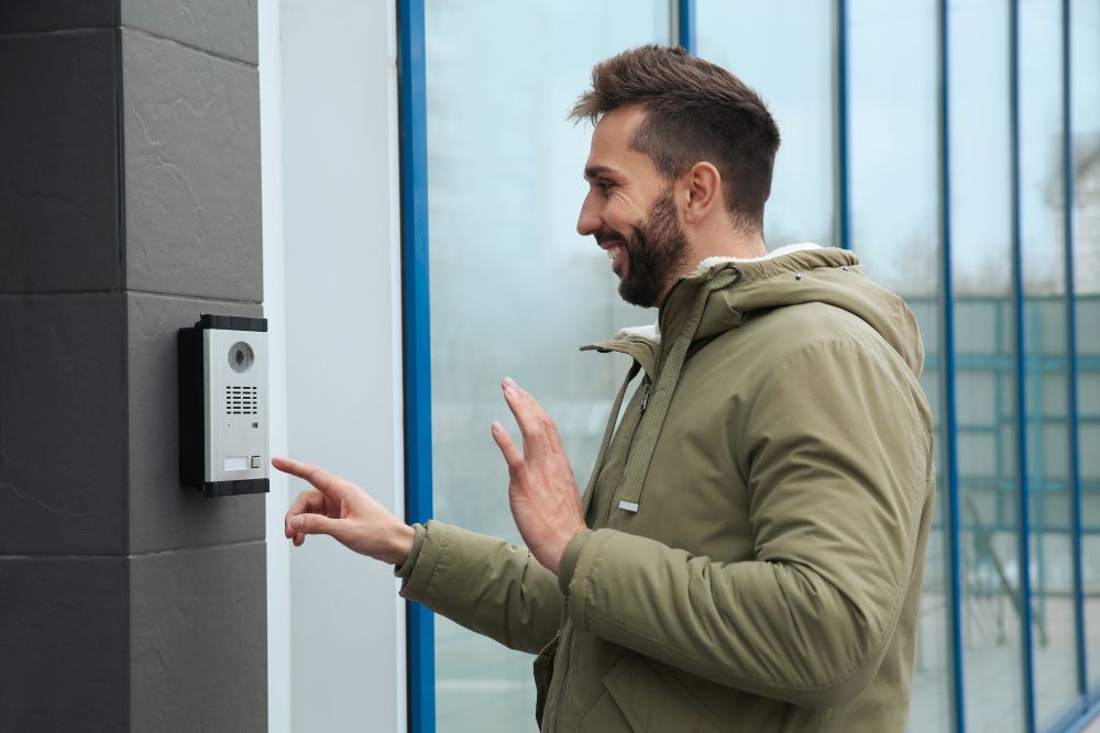 Man ringing doorbell
