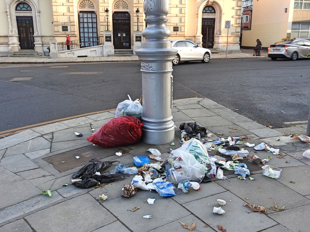 Opened rubbish bags on Merrion Street Lower, Dublin, Ireland. Derick P. Hudson, Shutterstock