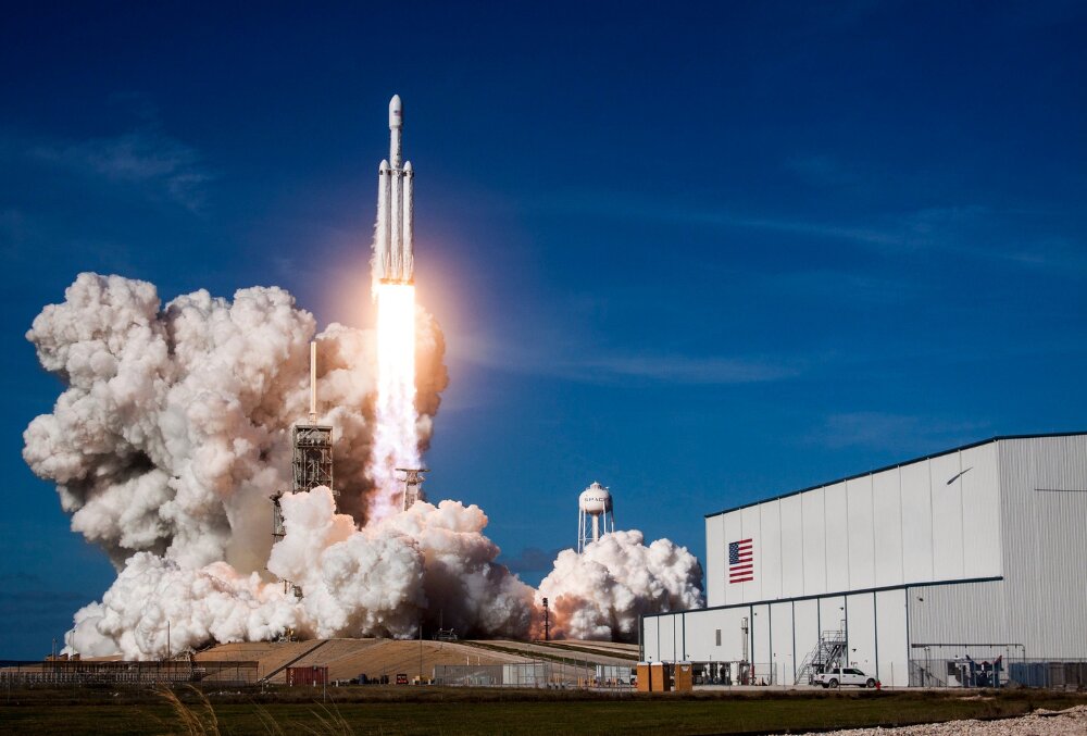 Rocket launches into space. Rawpixel, Shutterstock