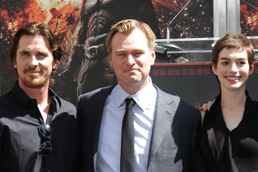 Christopher Nolan picked Christian Bale and Anne Hathaway to star in his masterpiece, The Dark Knight Rises. Shutetrstock