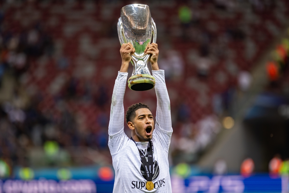 Jode Bellingham holds UEFA Super Cup 2024. Mikolaj Barbanell Shutterstock