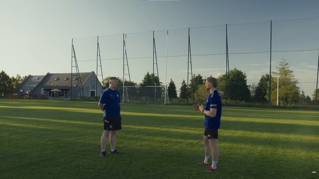 On & Off the Pitch Episode 3: Brothers Killian & Cathal O'Gara. Pictured: Killian an Cathal chat on GAA pitch. Credit: Movember