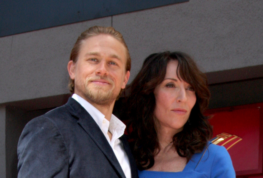 Charlie Hunnam Reuniting ‘Sons Of Anarchy’ Cast For New Limited Series 3 Katey Sagal plays Charlie Hunnam's on-screen mother in Sons Of Anarchy. Photo credit: Kathy Hutchins, Shutterstock