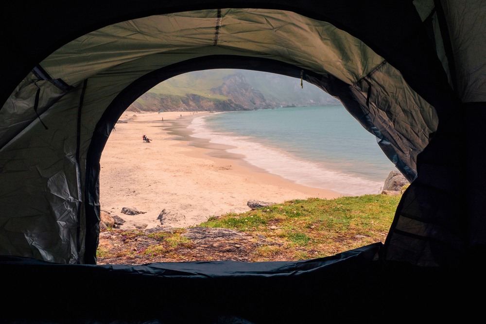 View on amazing Keem beach from a tent. Achill island, county Mayo, Ireland. Photo credit: Shutterstock